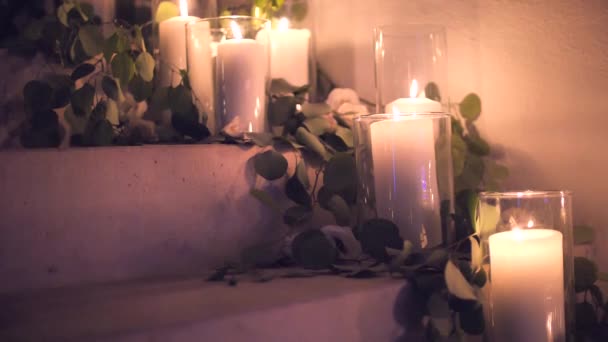 Many Large Candles Burn Glass Glasses Large Tall Wedding Candles — Stock Video