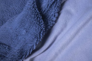 Mavi kumaş, dokulu arka plan. Tasarım kağıdı, arkaplan metni, resimler, afişler, reklam panoları, broşürler için uygun