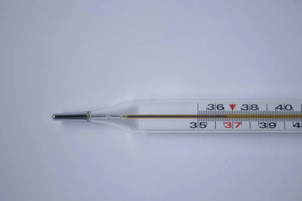 mercury thermometer on a white background. medicine and disease concept. Isolated