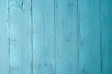 Doğal eski ahşap dikey plakalar çatlaklar mavi renkle boyanmış. Eski stil arka plan kopya alanı ile dokulu. Yukarıdan görüntülemek.