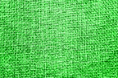 Doğal çuval bezi ile boş arka plan doku ayrıntılı. Ekoloji dostu kaba kumaş konuları karışımı parlak elektrik yeşil #32 cd 32 ve beyaz renkler renkli. Uzay kopyalayın. Yukarıdan görüntülemek.