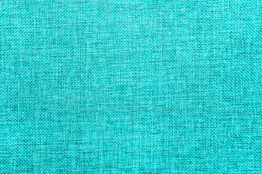 Doğal çuval bezi ile boş arka plan doku ayrıntılı. Ekoloji dostu kaba kumaş konuları parlak turkuaz ve beyaz renkler grubunda renkli. Uzay kopyalayın. Yukarıdan görüntülemek.