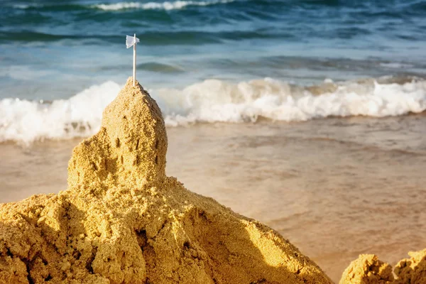 Golden sand castle background with copy space