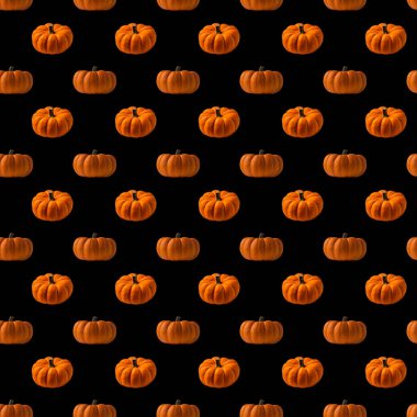 Yan ve yüksek açılı parlak turuncu yuvarlak balkabağı desenli siyah arkaplan görünümlü kusursuz desen.