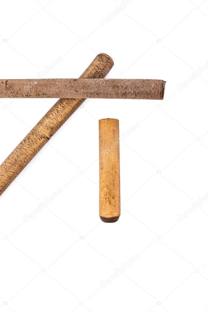 Ebonite sticks isolated on white background, with shadows. Also is known as hard rubber or vulcanite