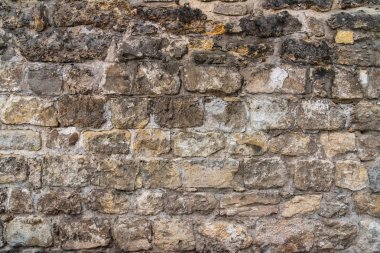 Taş duvar zaman yaşlı. Arka plan ve tasarım çalışmaları için doku
