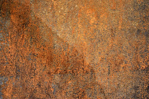 Sample of worn by time fiberboard with shabby, dirty, and cracked paint and relief texture. Grunge background in brown color — Stock Photo, Image