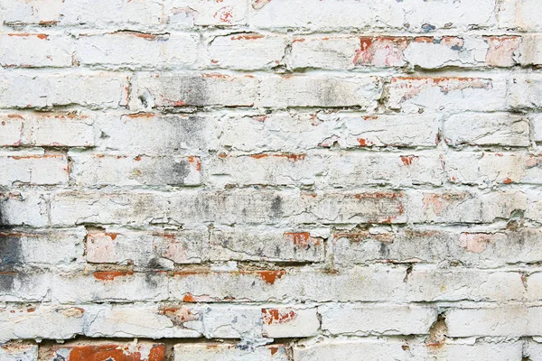 White color brick wall, weathered cracked and dirty, design background