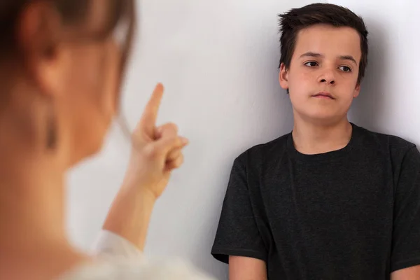 Woman Lecturing Her Teenager Son Pointing Finger Boy Bored Expression — Stock Photo, Image