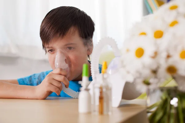 Young Boy Using Nebulizer Inhaler Device Medication Bottles Foreground Respiratory — Stock Photo, Image