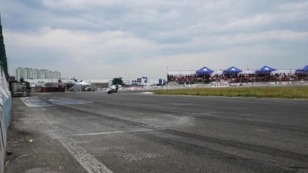 Kyiv, Ukraine - June 30, 2018: MotoGP riders go through the corner by apex — Stock Video