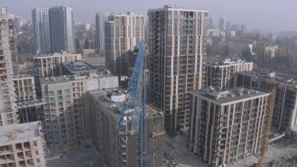 Close up of building crane at building area. Air view — Stock Video