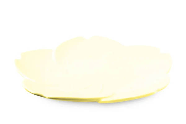 stock image Yellow flower shape plate isolated on white background.