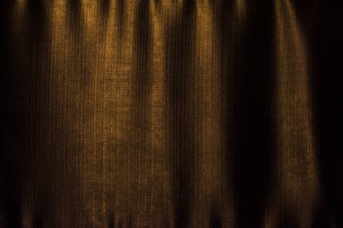 Altın veya kahverengi fablic dokuyu kapatın. 