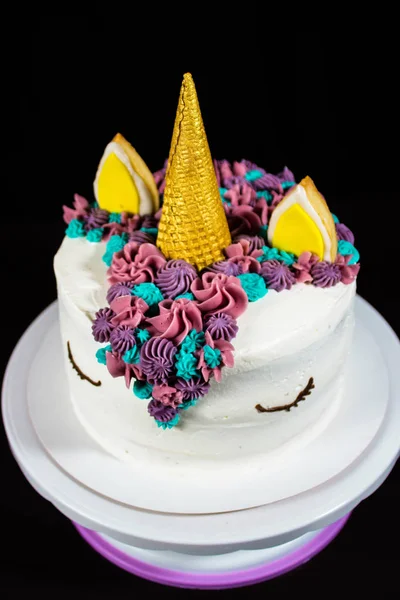 Unicorn Cake / Unicorn cake decorated with waffle cone and buttercream