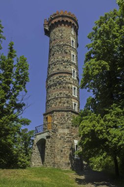 Summer view of the stone lookout tower Cvilin/Czech Republic/
