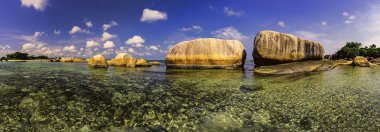 Panoramic view of a group of big stones on the Tanjung Tinggi beach from island Belitung/Indonesia/ clipart