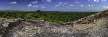 Panoramic views from the top of a large stone Bagindi the surrounding landscape / Belitung-Indonesia /