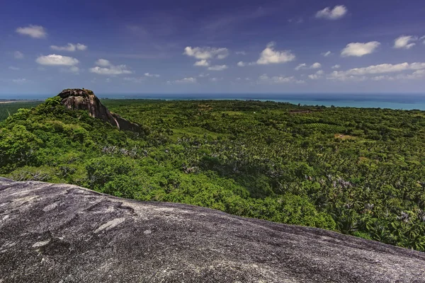 View from the top of a large stone Bagindi the surrounding landscape / Belitung-Indonesia /