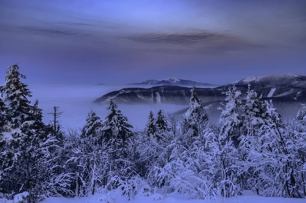 Inverse winter evening mountains in Beskydy — Stock Photo, Image