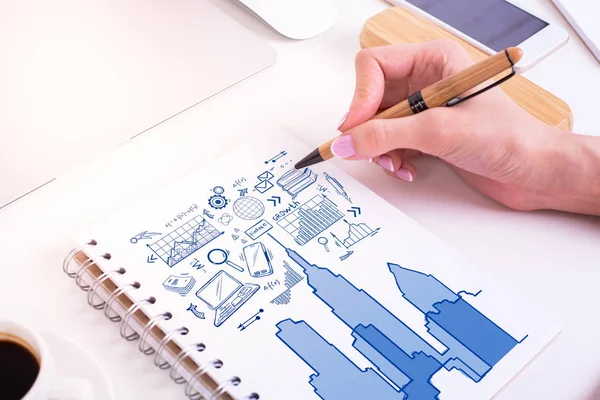 Γυναικείο Χέρι Σχεδίασης Δημιουργική Επιχειρηματική Σκίτσο Στο Σημειωματάριο Σπιράλ Τοποθετείται — Φωτογραφία Αρχείου