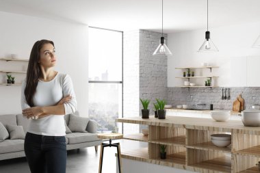 Modern mutfak iç ayakta oldukça düşünceli genç bayan portresi. Yaşam tarzı ve ev kavramı. 3D render 