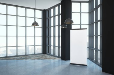 Zeminden tavana uzanan pencere ve megapolis şehir manzaralı ferah çatı odasında beton zemin üzerine boş poster. 3D render