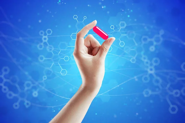 Mão Mulher Mostrando Pílula Mágica Fundo Azul Biotech — Fotografia de Stock