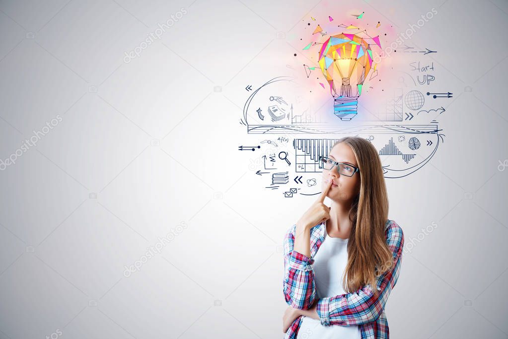 business idea concept with young thinking woman in glasses with colorful 3d bulb illustration above the head and ideas sketch on white wall background