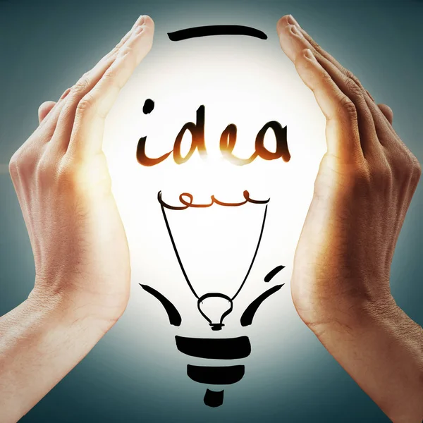 Business Idea Concept Drawn Light Bulb Two Hands Holding Abstract — Stock Photo, Image