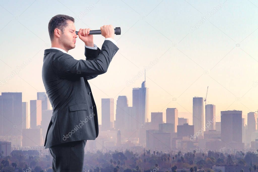 look into the future concept with businessman looking through a telescope at megapolis city background