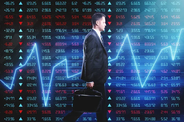 walking businessman at forex trade market background with glowing graphs and index screen