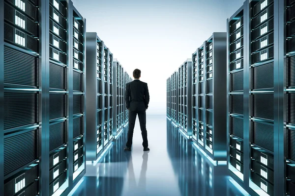 Back View Young Businessman Shiny Server Room Technology Concept Rendering — Stock Photo, Image