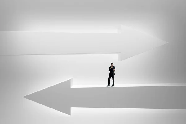 Businessman on abstract white arrows. Choice, direction and success concept. 3D Rendering
