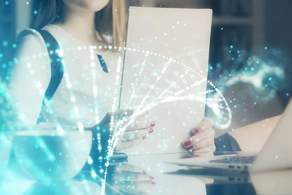 DNA theme hologram over womans hands writing background. Concept of education. Double exposure — Stock Photo, Image