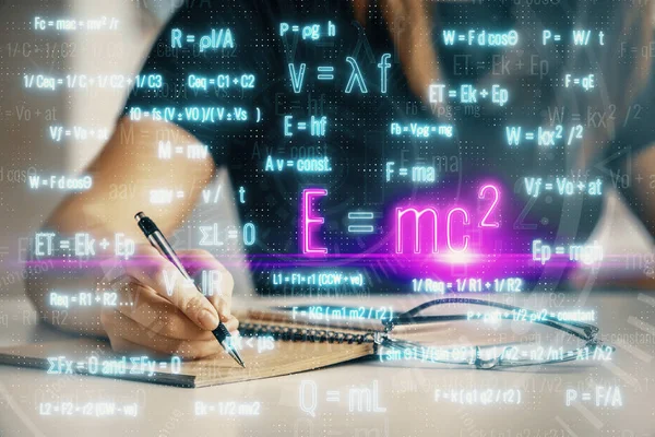 Science formula hologram over woman's hands taking notes background. Concept of study. Multi exposure — Stock Photo, Image
