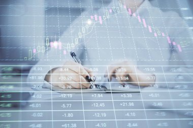 Finansal grafik el notları arka plan alarak üzerinde çizilmiş. Araştırma kavramı. Çoklu pozlama