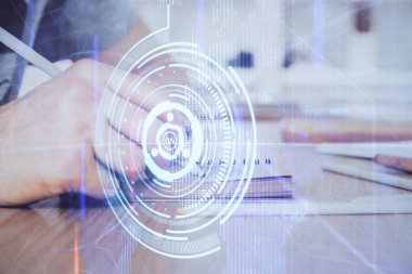 Teknoloji temalı çoklu pozlama simgeleri ile insan elleri yazılıyor.