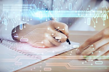 Teknoloji simgeleri ile adamın elini yazma.