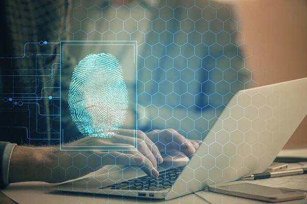Vingerafdruk hologram met zakenman werkt op de computer op de achtergrond. Veiligheidsconcept. Dubbele blootstelling. — Stockfoto