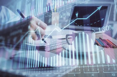 Finansal grafik el notları arka plan alarak üzerinde çizilmiş. Araştırma kavramı. Çift Pozlama