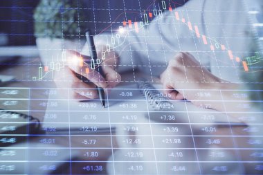 Finansal Forex grafik eller notları arka plan alarak görüntülenir. Araştırma kavramı. Çift Pozlama