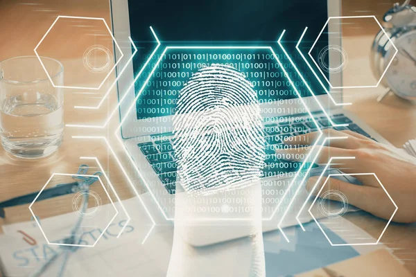 Fingeravtryck hologram med affärsman som arbetar på dator på bakgrunden. Säkerhetskoncept. Dubbel exponering. — Stockfoto
