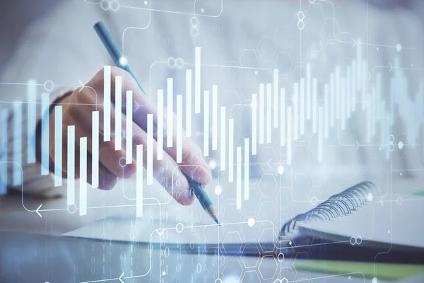 Gráfico de divisas financieras que se muestran en las manos tomando notas de fondo. Concepto de investigación. Doble exposición — Foto de Stock