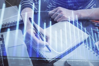 Finansal grafik el notları arka plan alarak üzerinde çizilmiş. Araştırma kavramı. Çift Pozlama