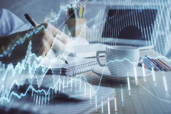 Financial chart drawn over hands taking notes background. Concept of research. Double exposure — Stock Photo, Image