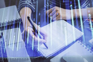Finansal grafik el notları arka plan alarak üzerinde çizilmiş. Araştırma kavramı. Çift Pozlama