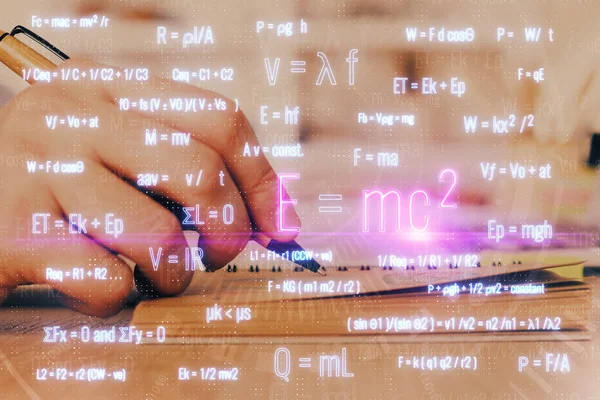 Student or teacher with mathematical and scientific formulas. Concepts of education. — Stock Photo, Image