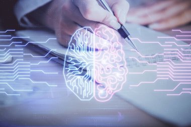 Arka planda kadının el yazısı ve beyin hud 'u var. Öğrenme kavramı.