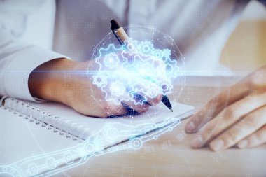 Teknoloji simgeleri ile adamın elini yazma.